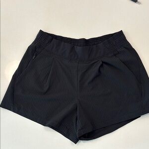Athleta Brooklyn style black seersucker shorts.